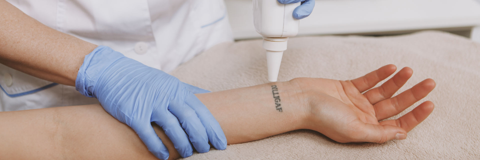 A dermatologist performing laser skin removal.